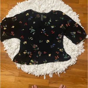 Anthropology black with needle point flowers M